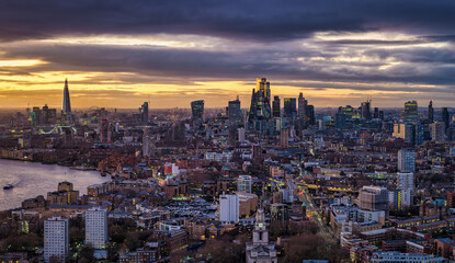Fototapeta premium The London skyline with City skyscrapers and Thames River during dusk, United Kingdom
