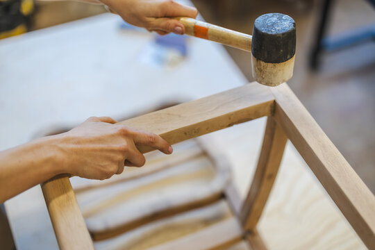 Assembling Wooden Chair Frame with Mallet
