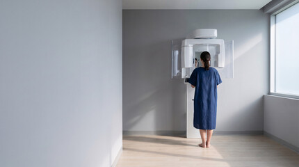 Fototapeta premium Minimal Dental Radiology Room with Patient Scan