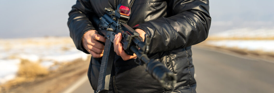 Terrorist Criminal Holding Weapon in Hand