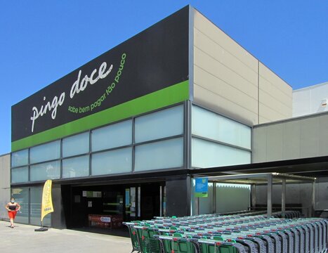 Pingo Doce supermarket exterior and shopping carts in Portugal