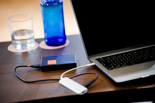 External hard drive connected to laptop for data backup