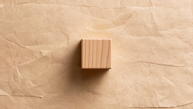 Minimalist Wood Block on Textured Brown Craft Paper Background