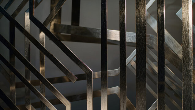 Abstract Metal Grid Architecture with Geometric Pattern and Angled Light