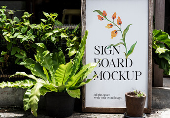 Outdoor Signboard Mockup With Plants PSD