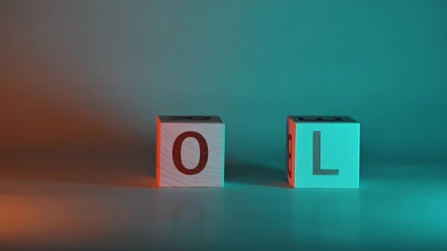 Hands arrange colorful blocks to spell the word goal. The blocks change from scattered letters to a clear word, emphasizing focus and determination