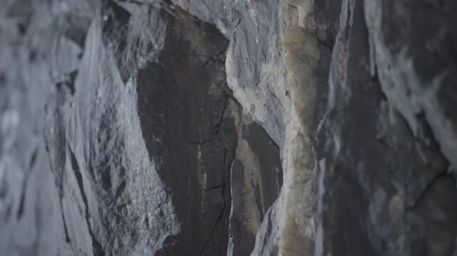 Rough gray stone rock wall texture background