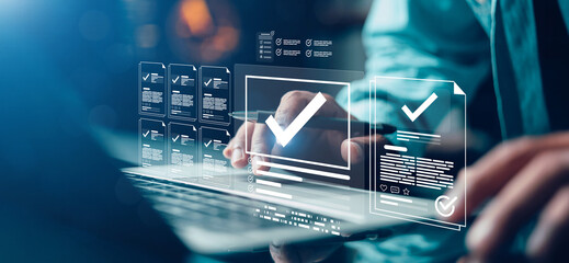 Businessman using digital checklist system for document approval, workflow management and quality...