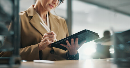 Hands, journalism and tablet with business woman in office for online magazine or proofreading...