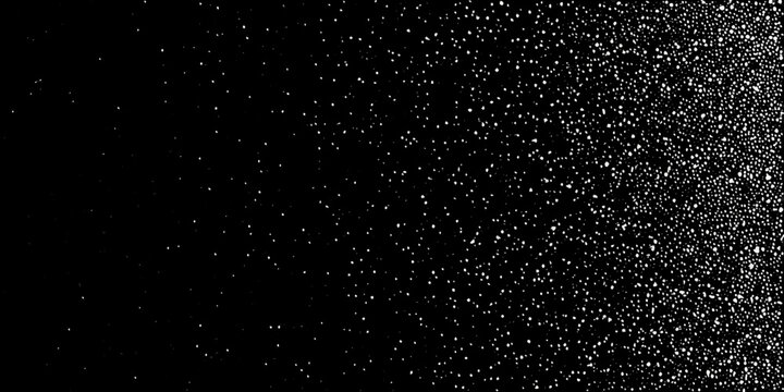 Dense scattering of small white dots against a black background