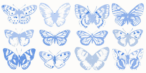 A collection of delicate blue butterflies in various poses and patterns © Sourav