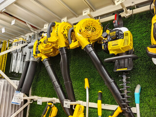 Naklejka premium Powerful tools for outdoor maintenance at local hardware store