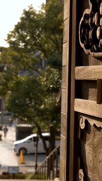 Intricate Wood Carving on Traditional Japanese Gate at Oyama Shrine