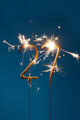 27 years celebration festive background with copy space made with Bengal fires in the form of...