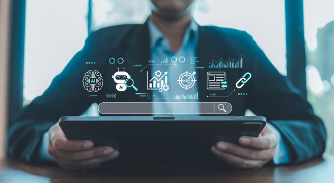 AI SEO analysis concept hands holding tablet digital hologram search bar brain robot keyword target link chain chart icons digital marketing strategy web ranking algorithm machine learning