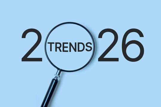 2026 Business Trends and Future Forecast Concept. Magnifying glass highlighting 2026 trends representing market outlook, strategic planning, innovation tracking, future business insights, finance