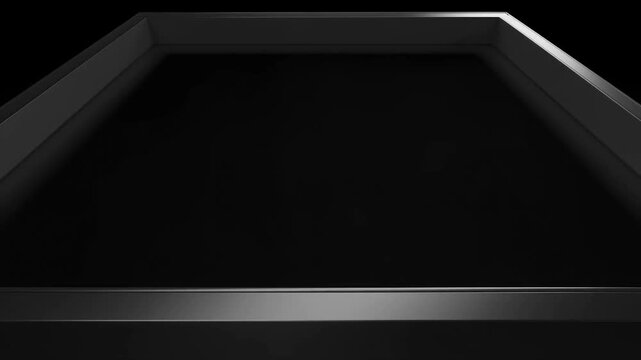 Tracking shot of glossy black platform revealing beveled reflective edge across dark studio backdrop with subtle lateral motion