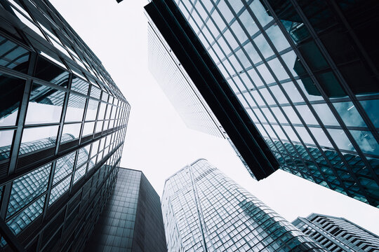 Frankfurt Bankenviertel glass skyscrapers show modern architecture offices and urban perspective as reflective facade adds Germany contrast in financial district canyon