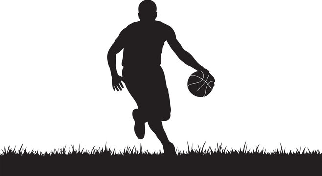 Silhouette of a basketball player dribbling a ball on a grassy field