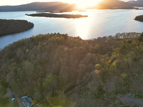 April 19th, 2026. Aerial View of Balmaha Valley Glasgow Landscape During Sunset Time. The village is a popular tourist destination for picnickers and day trippers from Glasgow
