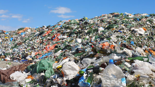 Massive Plastic Waste Pile at Landfill Site