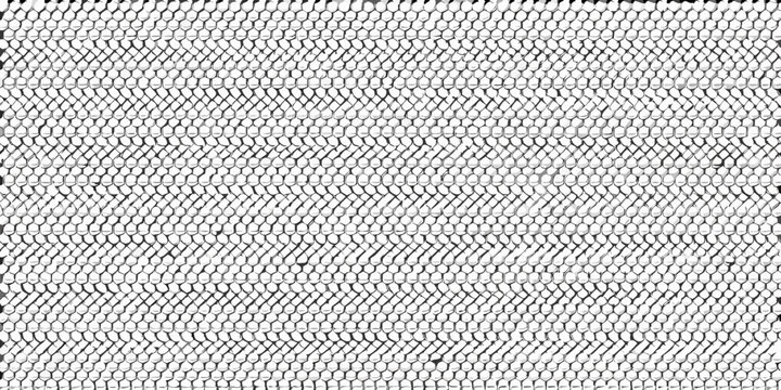 Close up of a woven texture resembling tire tracks in sand