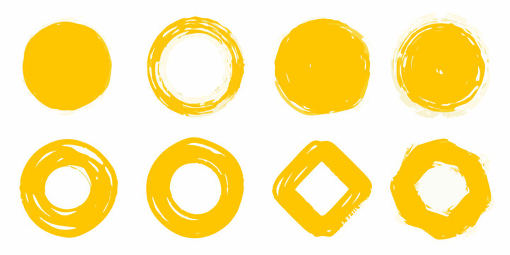 A collection of eight hand drawn textured yellow oval and diamond shapes