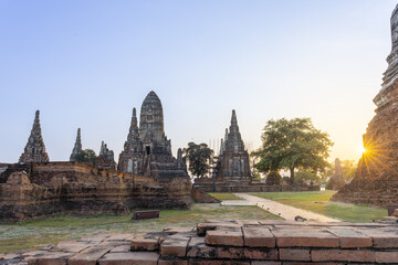 Serene ancient temple ruin featuring majestic historical pagoda architecture stands peaceful during beautiful sunrise highlighting traditional heritage park outdoors © CoreRock