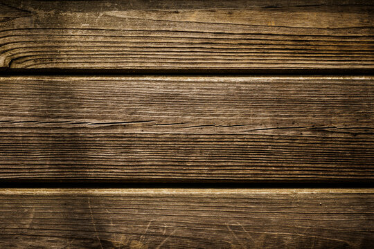 texture di tavole di legno vecchio e lavorato in primo piano