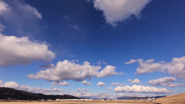 HD Reverse Timelapse of Thick Clouds Moving from Right to Left (No Audio)