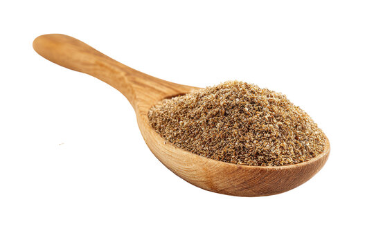 Wooden spoon filled with ajwain seeds isolated on transparent background. Ground ajwain seeds in wooden spoon for healthy food isolated on white background.