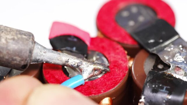 Repairing electronic parts with soldering tools in a workshop