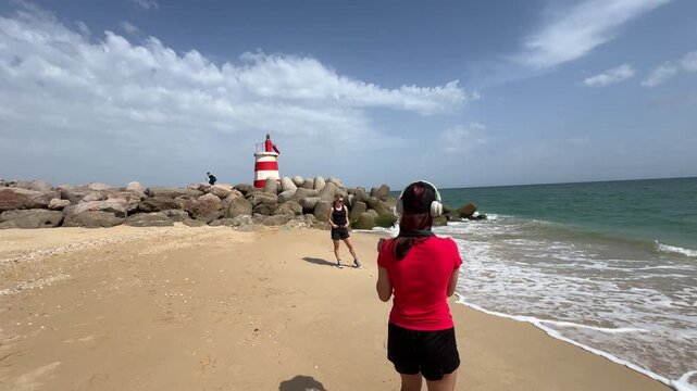 Praia da Ilha de Tavira, Portugal Lighthouse of the Tavira west jetty.