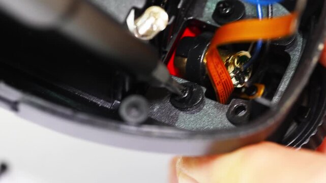 Repairing electronics step by step in workshop