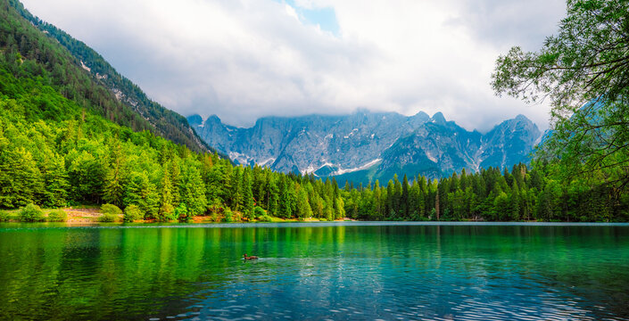 Lake of Fusine or Lago Superiore di Fusine in the Mountain Range of Mount Mangart in Julian Alps near Tarvisio in Italy near Slovenia