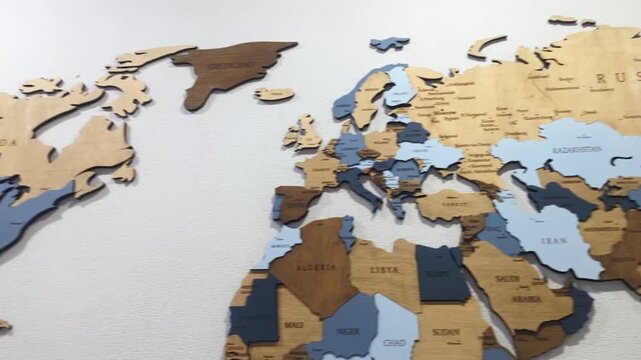 Review of a wooden map of the world. Political map of countries