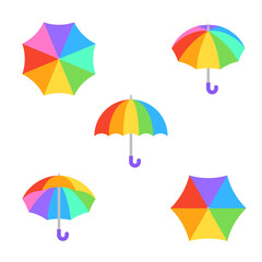 Obraz premium Colorful rainbow umbrella set with multiple sizes scattered on white background