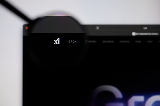 Milan, Italy - 2026, 20 Apr: xAI logo displayed under a magnifying glass on laptop screen displaying the xAI&rsquo;s website.