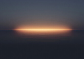 Fototapeta premium Sunrise over calm ocean water with a dark blue sky and warm light