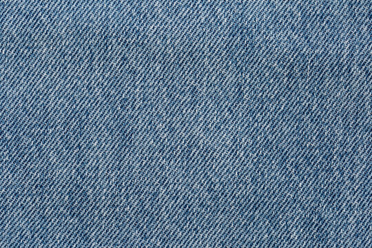 Closeup, macro of blue jeans denim fabric texture