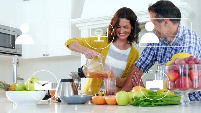 Woman pouring blender juice into glass man leaning touching arm icons floating fading for marketing