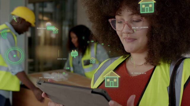 Site coordinator tapping tablet overlaying green AR icons while coordinating site crew and smiling