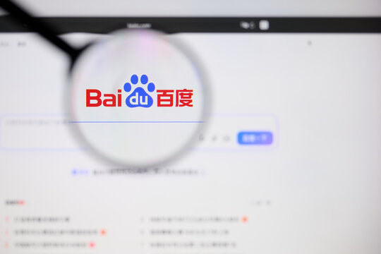 Milan, Italy - 2026, 20 Apr: baidu logo displayed under a magnifying glass on laptop screen displaying the