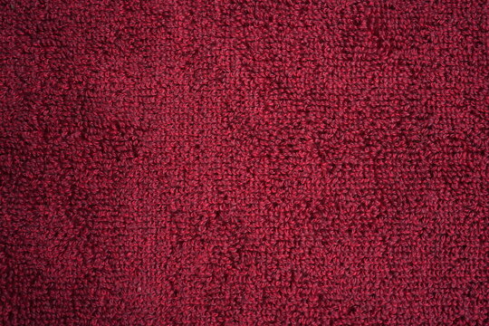 macro bordo terry towel texture, close up cotton towel texture red