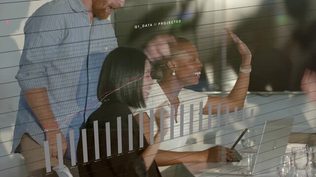 Seated women and team celebrating and pointing in business meeting as Q1 overlay rising over tablet