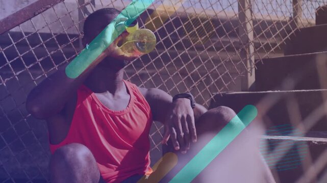 Man resting during cooldown sipping bottle while diagonal bars obscuring him then leaning back