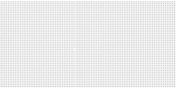 Close up of a white perforated metal panel with a regular pattern