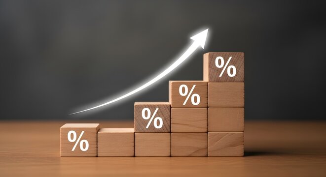 Wooden blocks with percentage signs and a rising white arrow representing financial growth and increasing interest rates.
