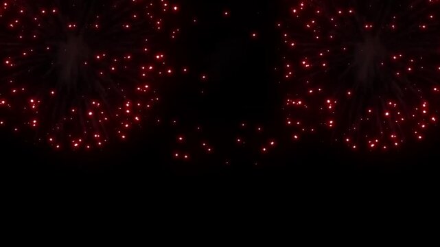 Colorful fireworks sparkle in the dark night sky, perfect for celebrations, New Year's Eve, anniversaries, and holiday festive backgrounds.