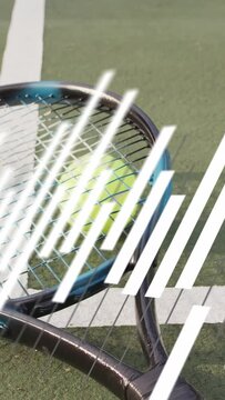 Vertical video: Diagonal bars sweeping causing camera pan showing blue racket with neon ball focus